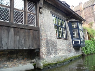 Old medieval building as seen from the canal