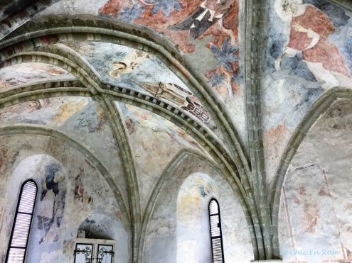 Faded frescoes on the ceiling